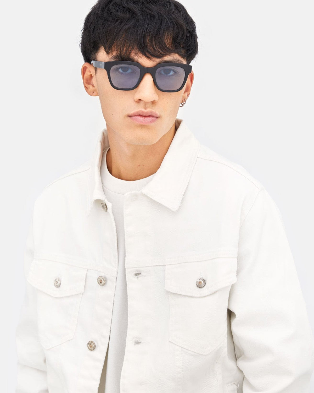 Model wearing RETROSUPERFUTURE Giusto Azure sunglasses, front view.