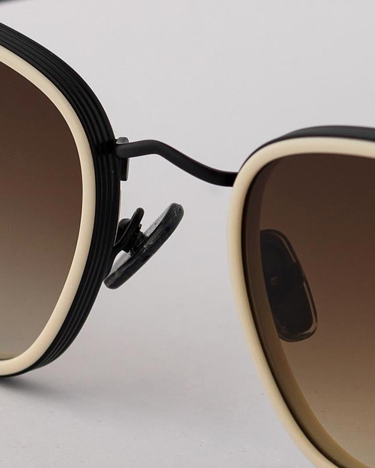 Detail of the adjustable nose pads on EYEPETIZER GLIDE C.CY-6-50 sunglasses.