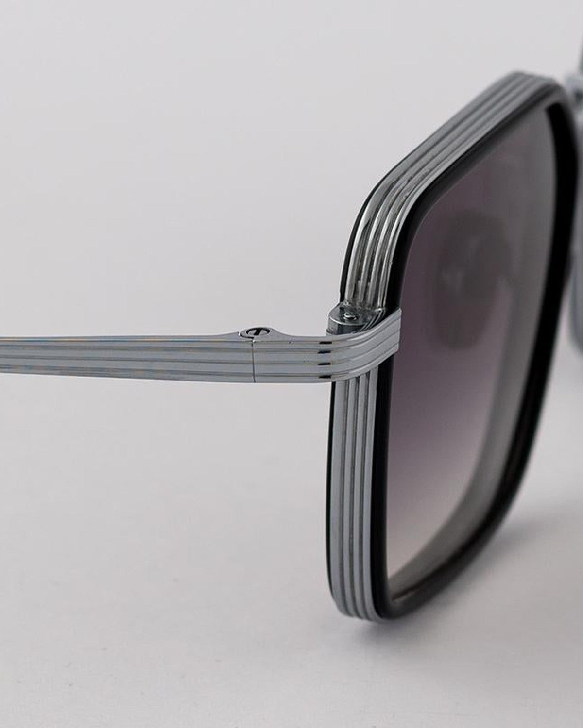 Detail of the ridged temple and hinge construction on EYEPETIZER GLIDE C.A-1-27 sunglasses.