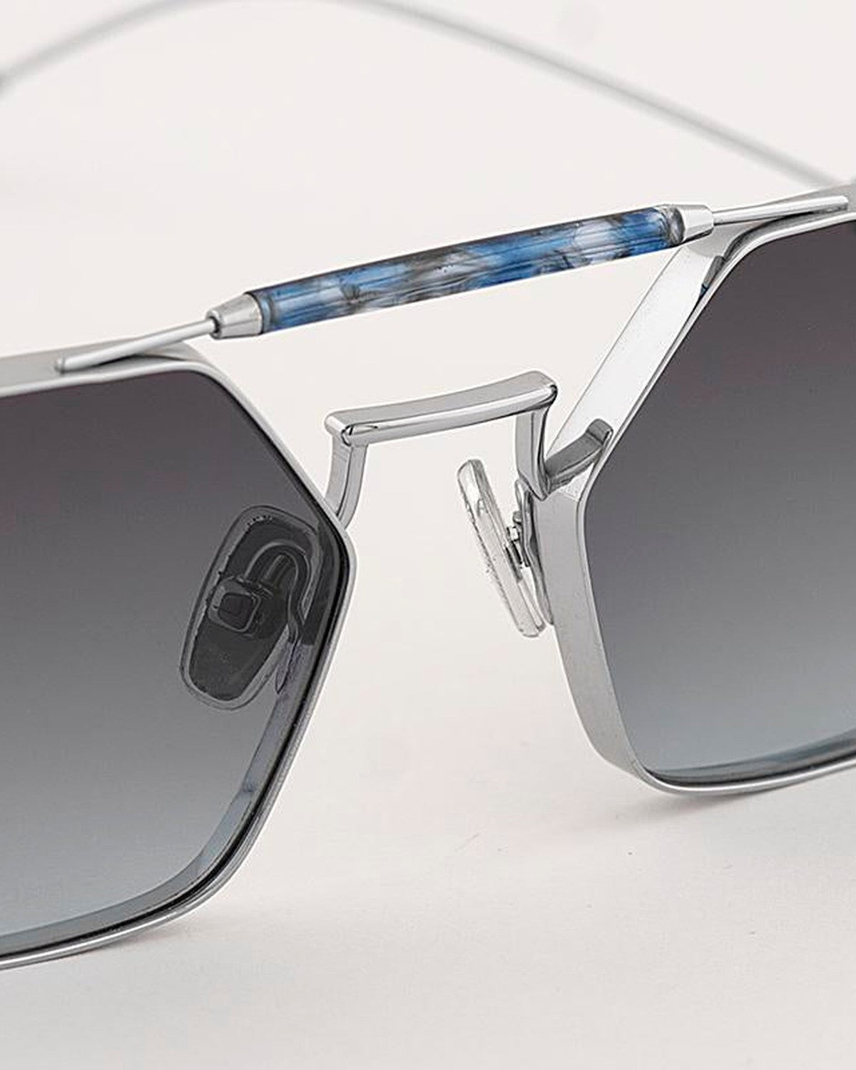 Close-up of the bridge and temple hinge connection on EYEPETIZER HAVANA C.1-69 sunglasses.
