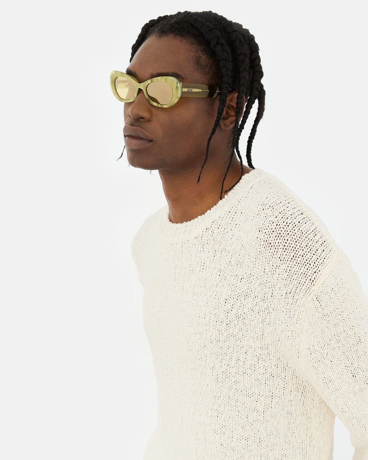 Model wearing RETROSUPERFUTURE Izipho Mindless sunglasses, side view.