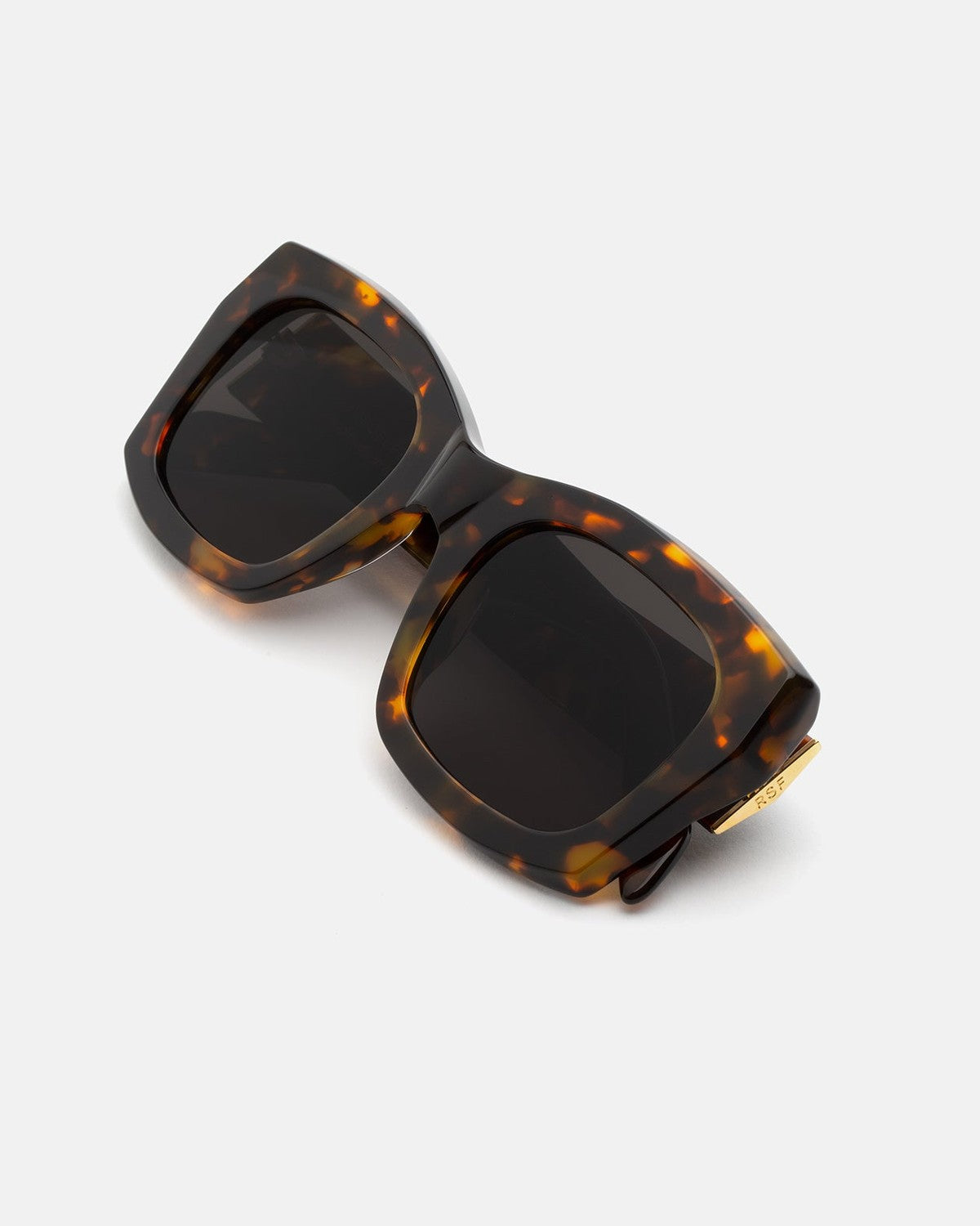 Overhead view of folded RETROSUPERFUTURE Komori Burnt Havana sunglasses.