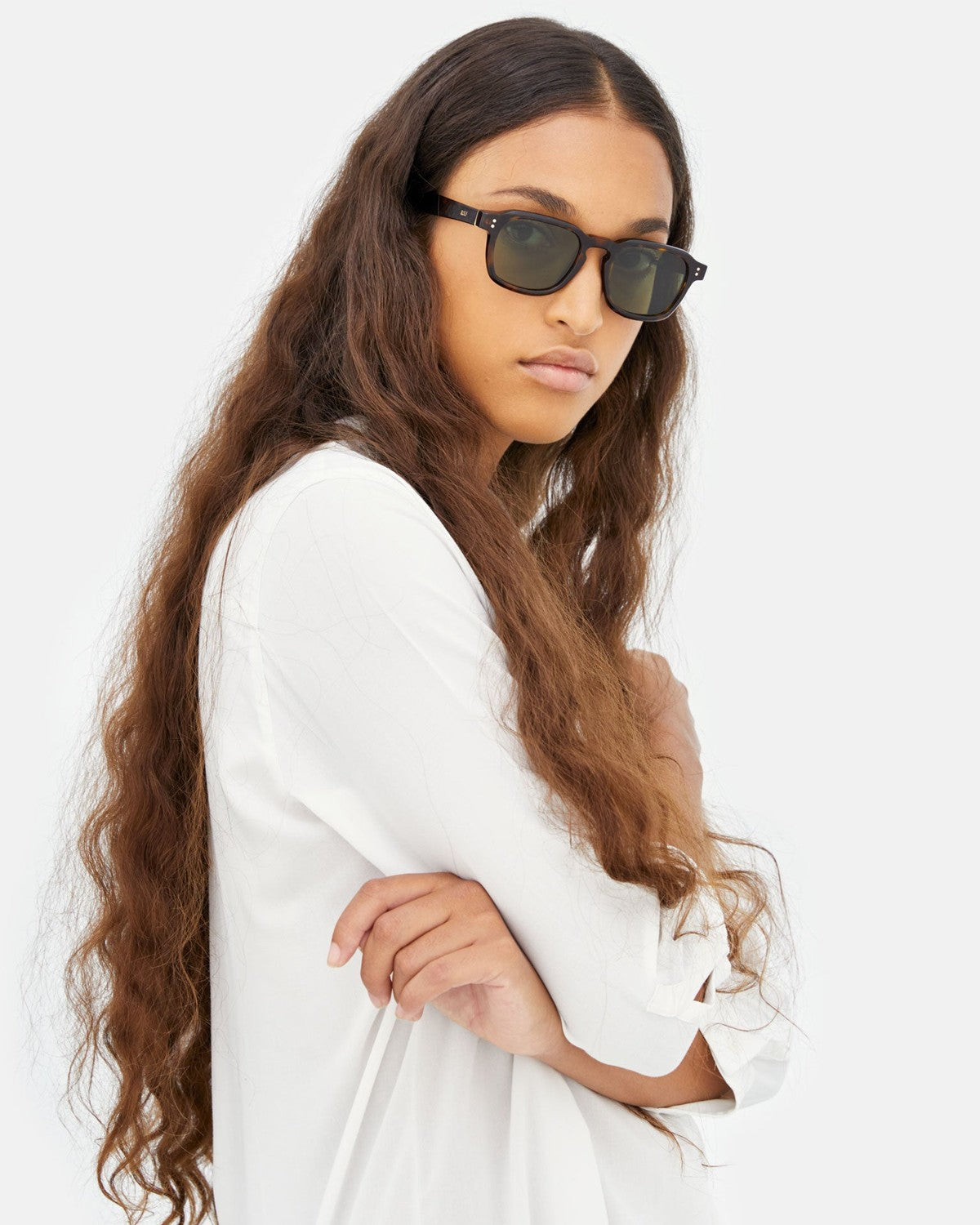 Model wearing RETROSUPERFUTURE Luce 3627 sunglasses.