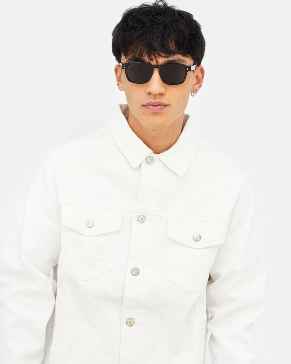 Person wearing RETROSUPERFUTURE Luce Black sunglasses.