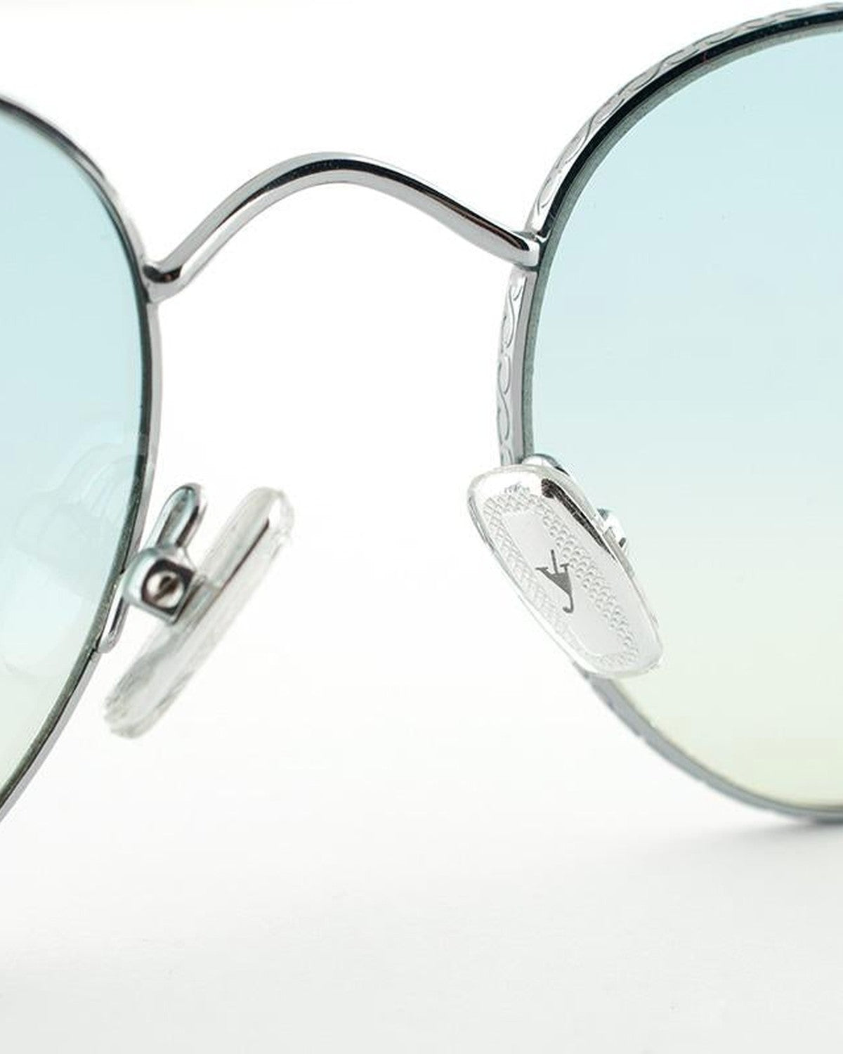 Detail of the bridge and nose pad mechanism on EYEPETIZER LUNE C.1-23F sunglasses.