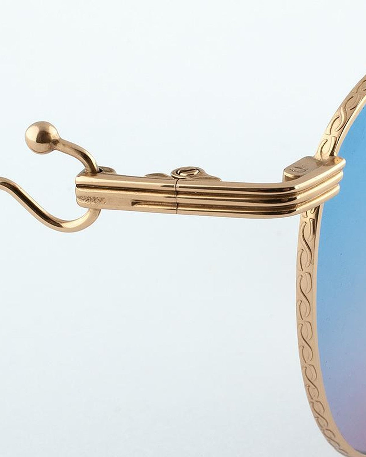 Close-up of the temple hinge and decorative wire detailing on EYEPETIZER LUNE C.4-42F sunglasses.