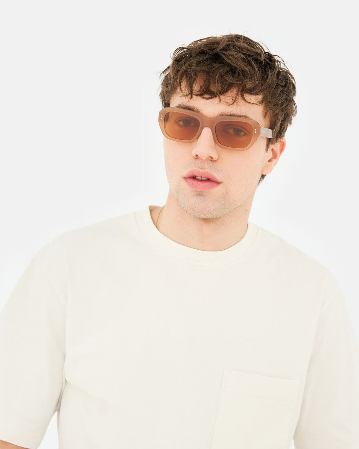 Model wearing RETROSUPERFUTURE Miles Cola sunglasses.