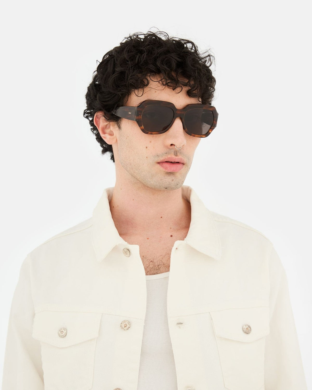 Model wearing RETROSUPERFUTURE Nala Havana Striata sunglasses, front view.