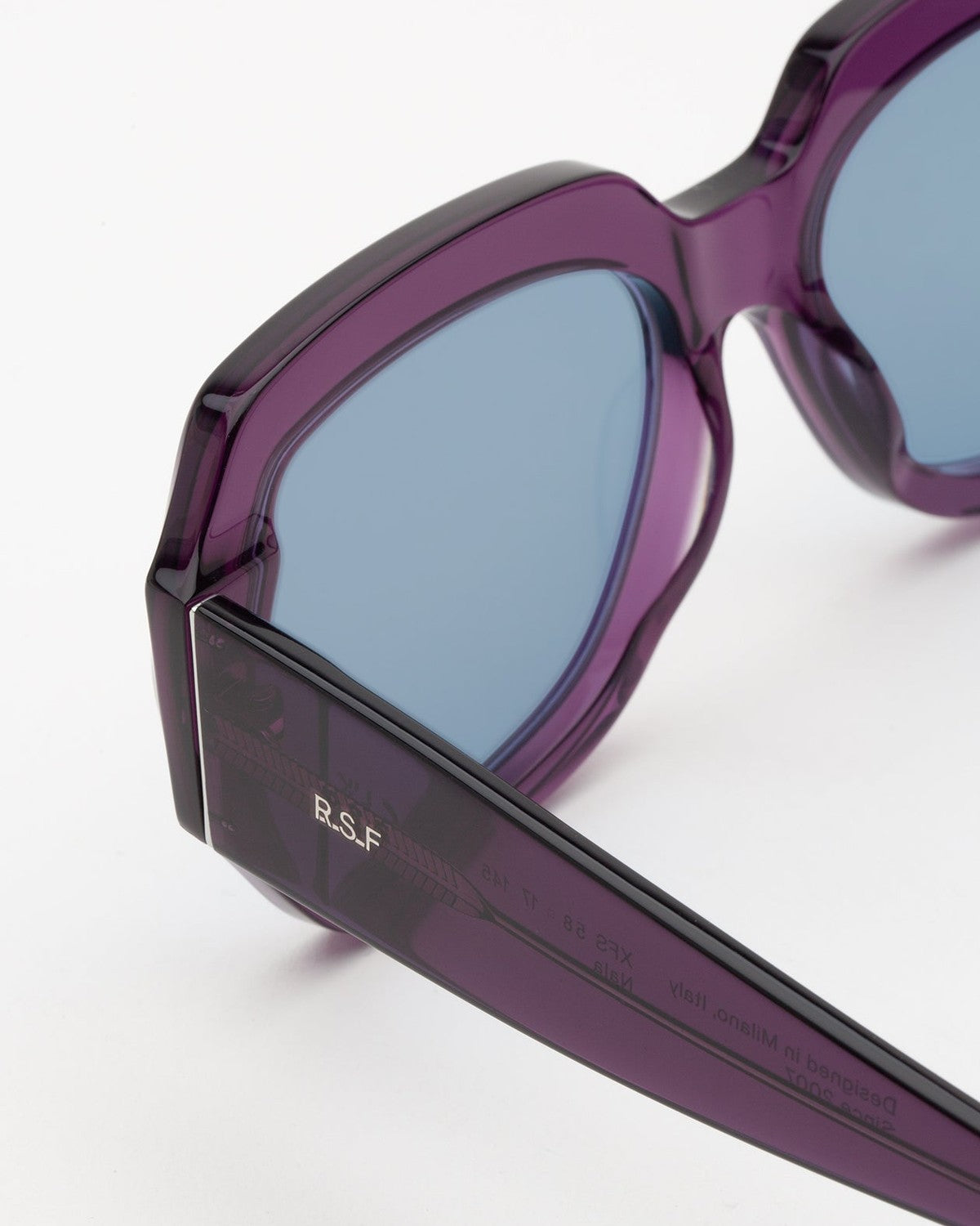 Close-up of the temple with branding on RETROSUPERFUTURE Nala Melanzana sunglasses.