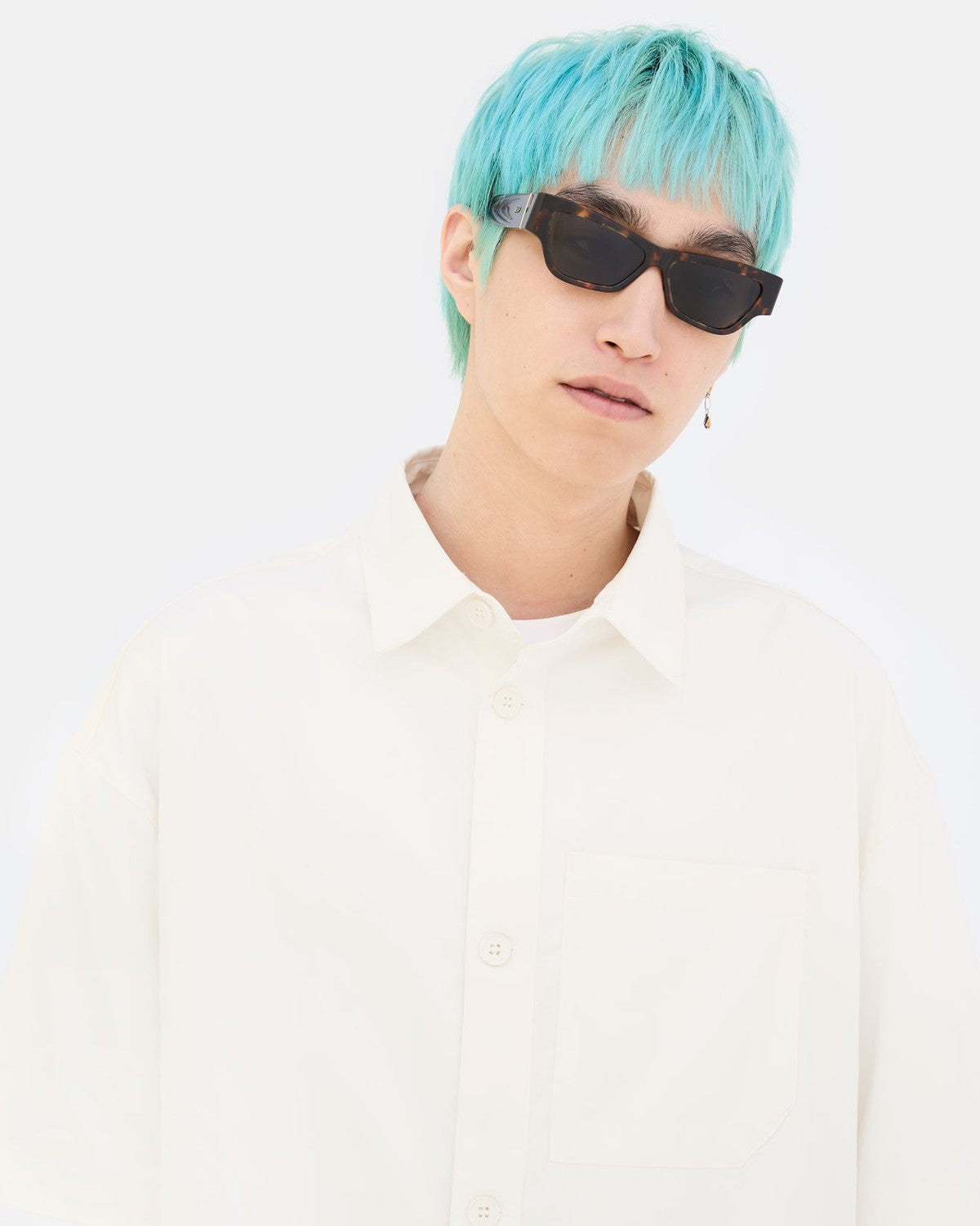 Model wearing RETROSUPERFUTURE Nameko Burnt Havana sunglasses.