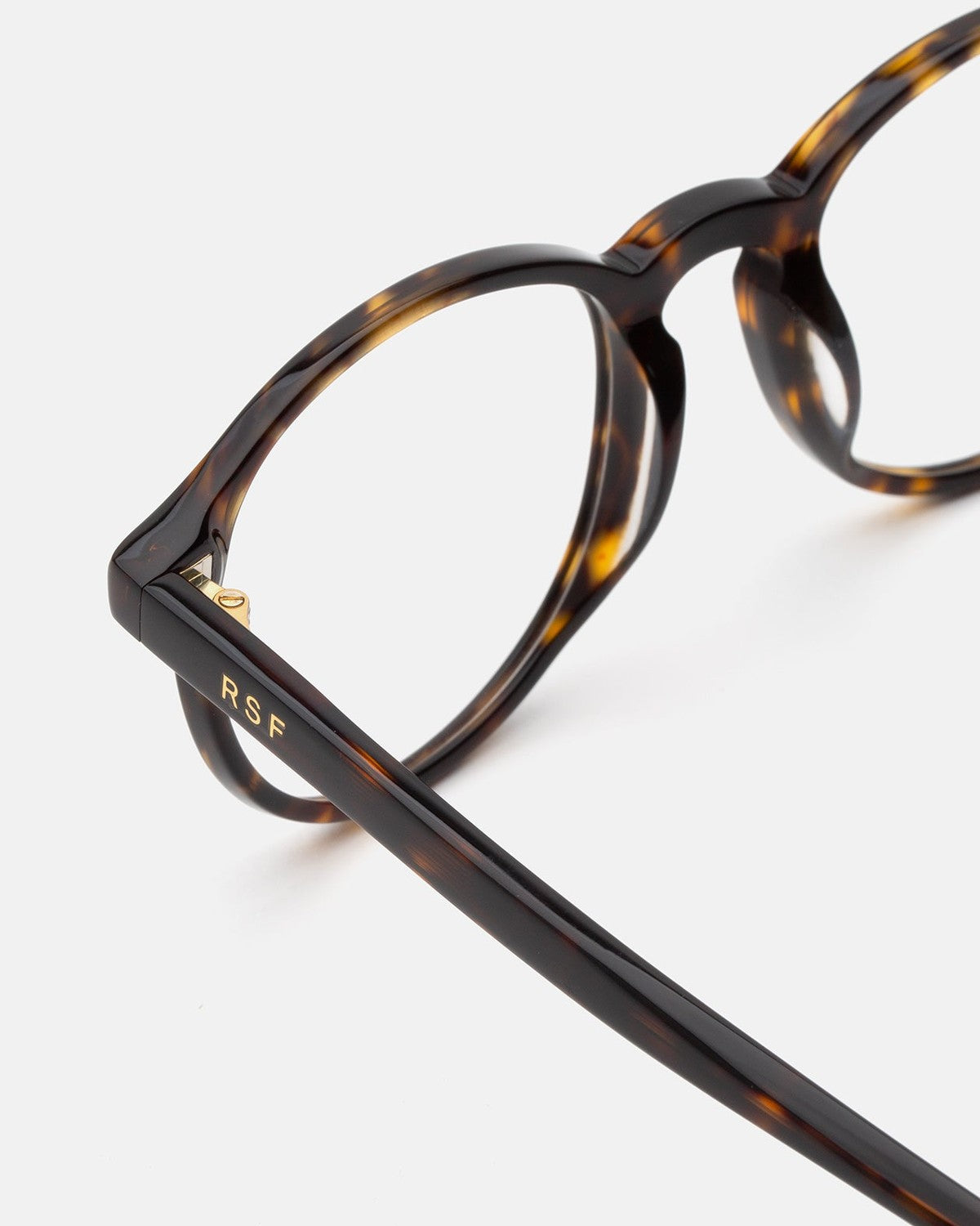 Close-up of the temple hinge and RSF branding on RETROSUPERFUTURE Numero 01 3627 sunglasses.