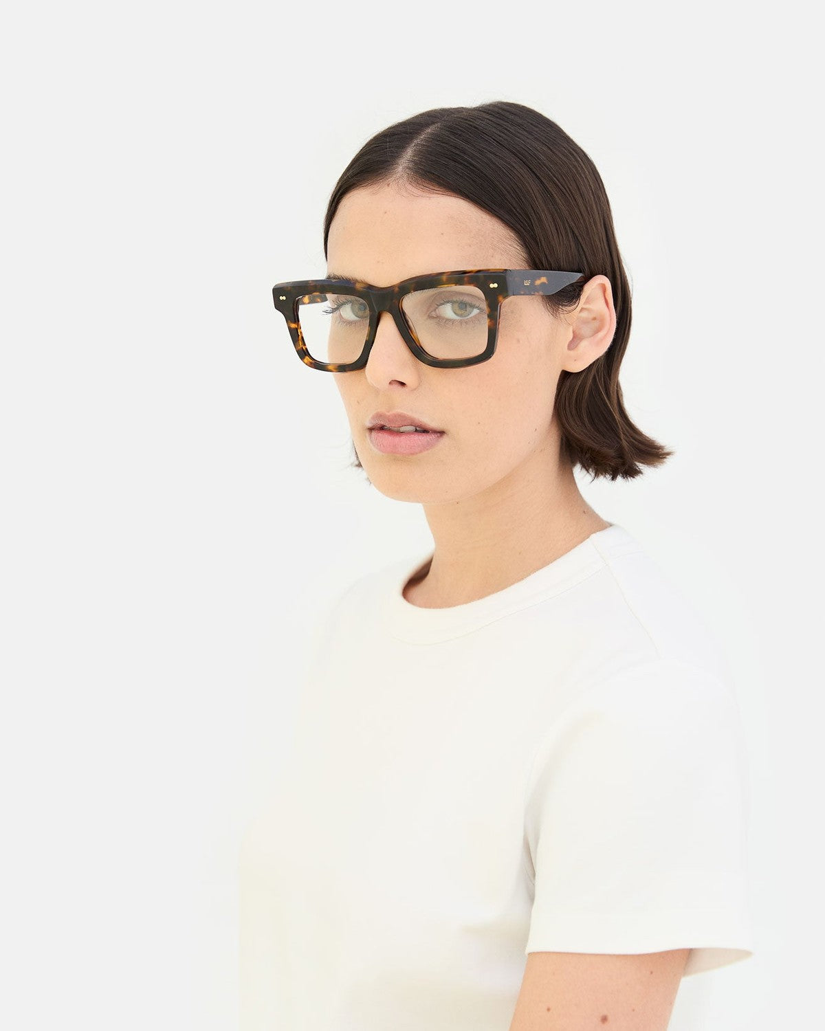 Side profile of model wearing RETROSUPERFUTURE Numero 116 Havana sunglasses.
