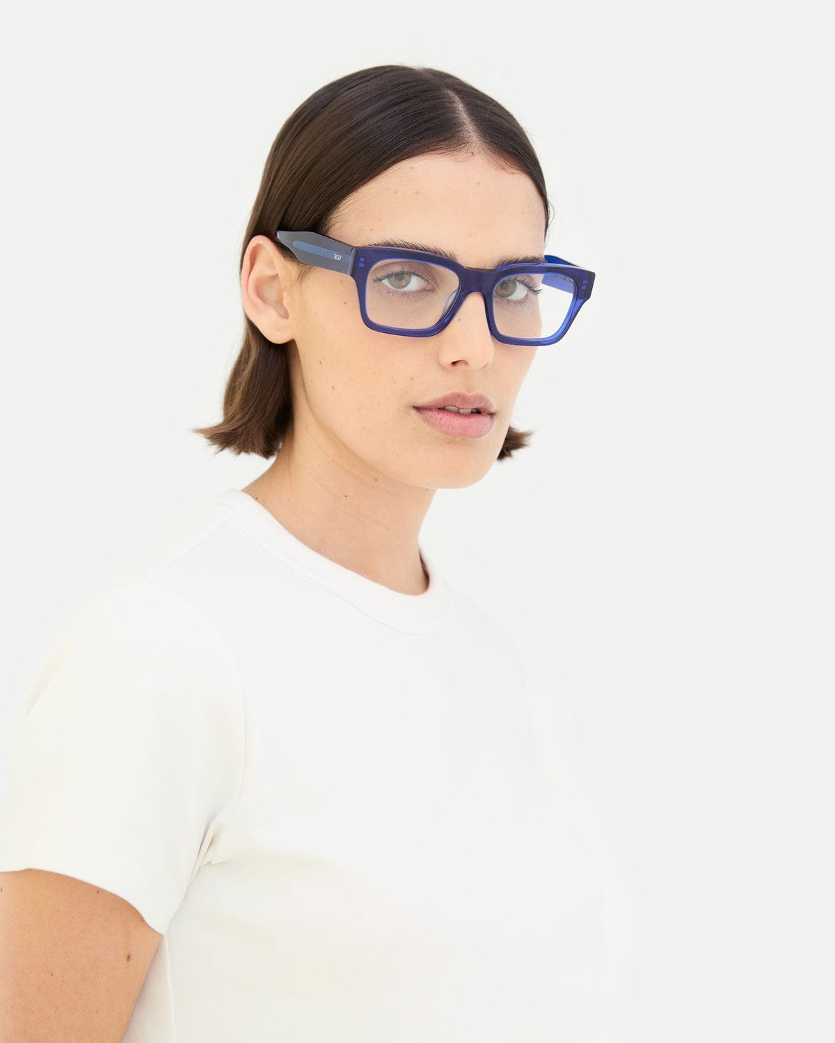 Model wearing RETROSUPERFUTURE Numero 119 Blue sunglasses.