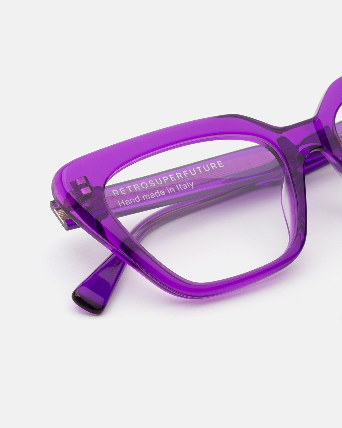 Close-up of the temple with RETROSUPERFUTURE branding on Numero 122 Purple sunglasses.