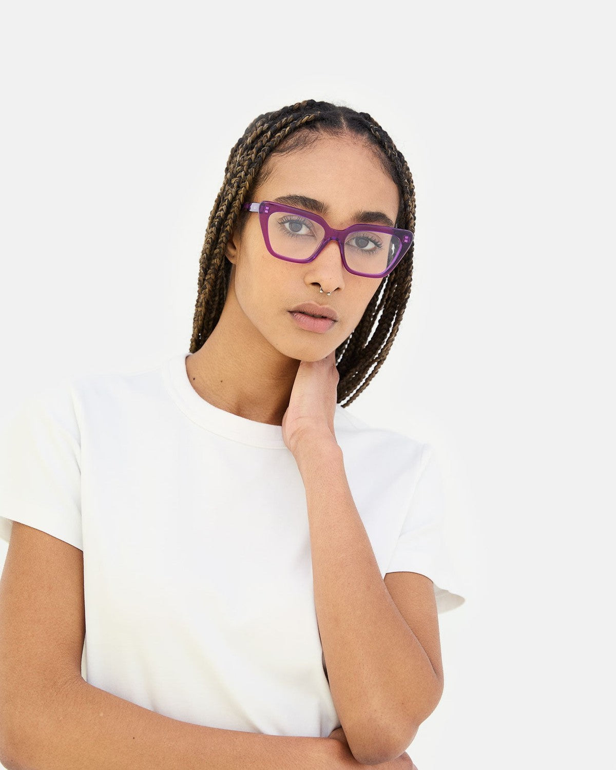 Model wearing RETROSUPERFUTURE Numero 122 Purple sunglasses with hand to chin.