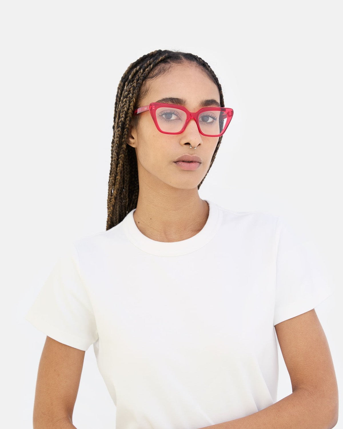 Model wearing RETROSUPERFUTURE Numero 122 Red sunglasses, front view.