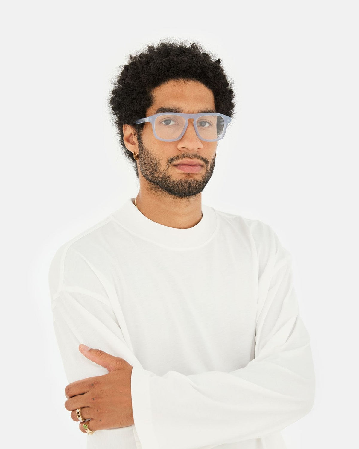 Model wearing RETROSUPERFUTURE Numero 123 Light Blue sunglasses.