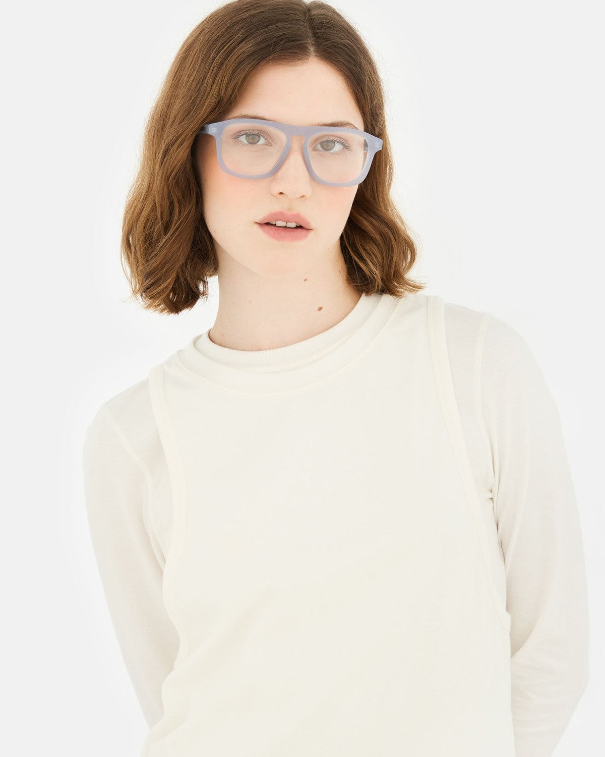 Front view of model wearing RETROSUPERFUTURE Numero 123 Light Blue sunglasses.