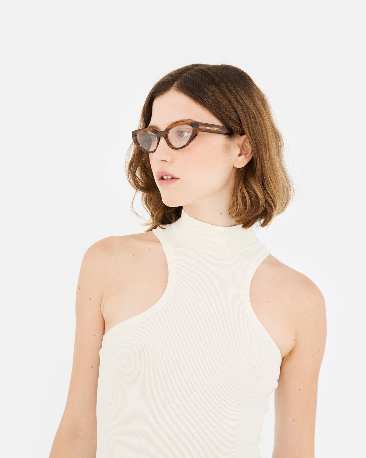 Model wearing RETROSUPERFUTURE Numero 124 Tangeri sunglasses, side view.
