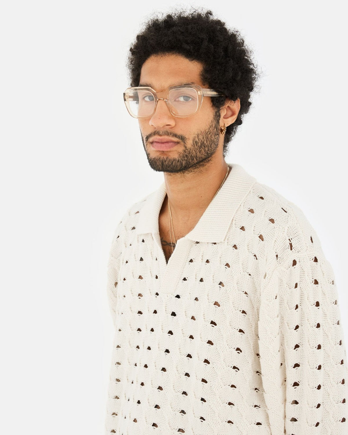 Model wearing RETROSUPERFUTURE Numero 125 Cream sunglasses.