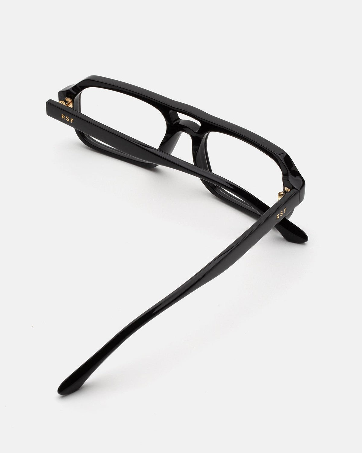 Interior view showing the temple and hinge structure of RETROSUPERFUTURE Numero 128 Black sunglasses.