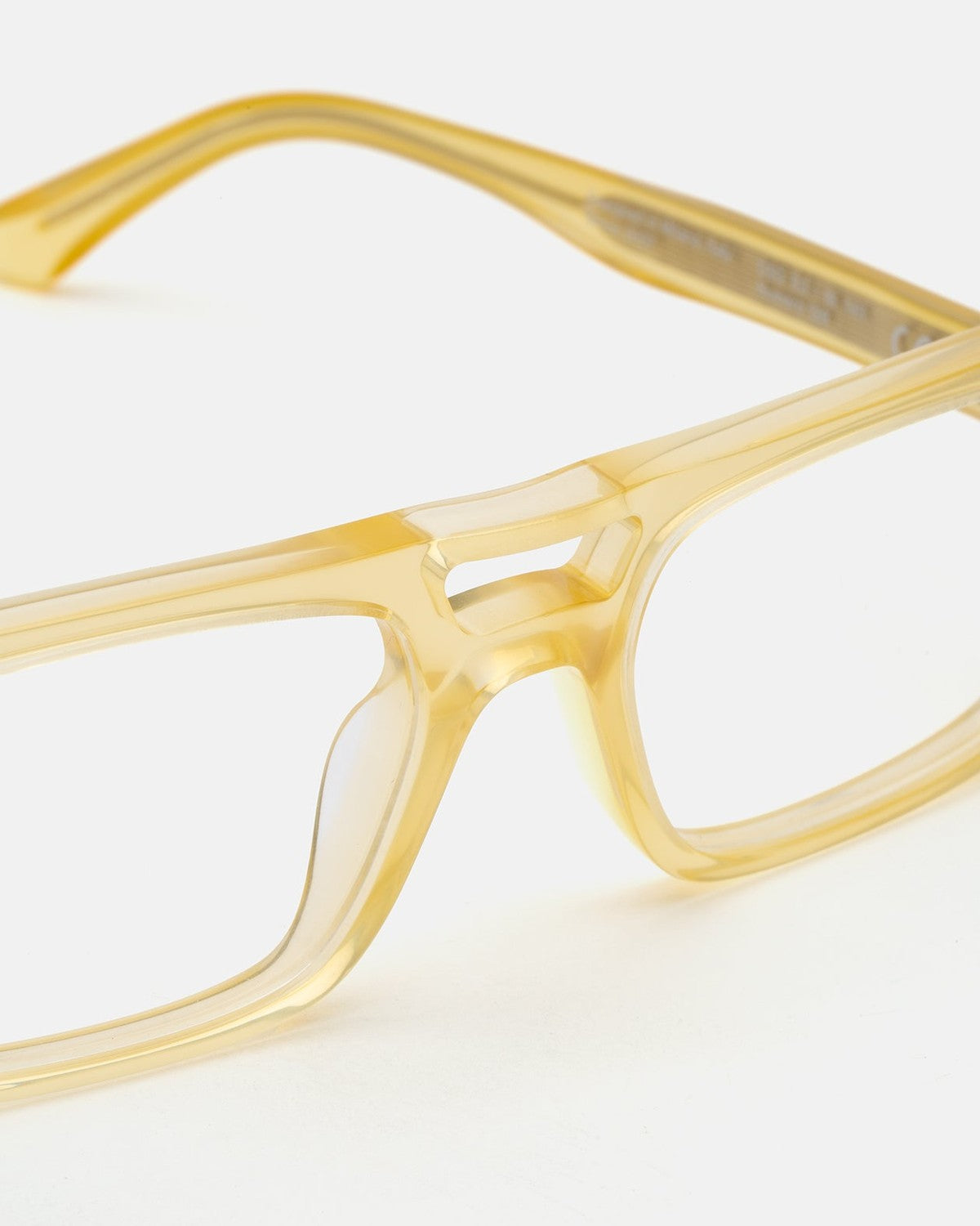 Close-up of the bridge and frame construction on RETROSUPERFUTURE Numero 128 Cremoso Q sunglasses.