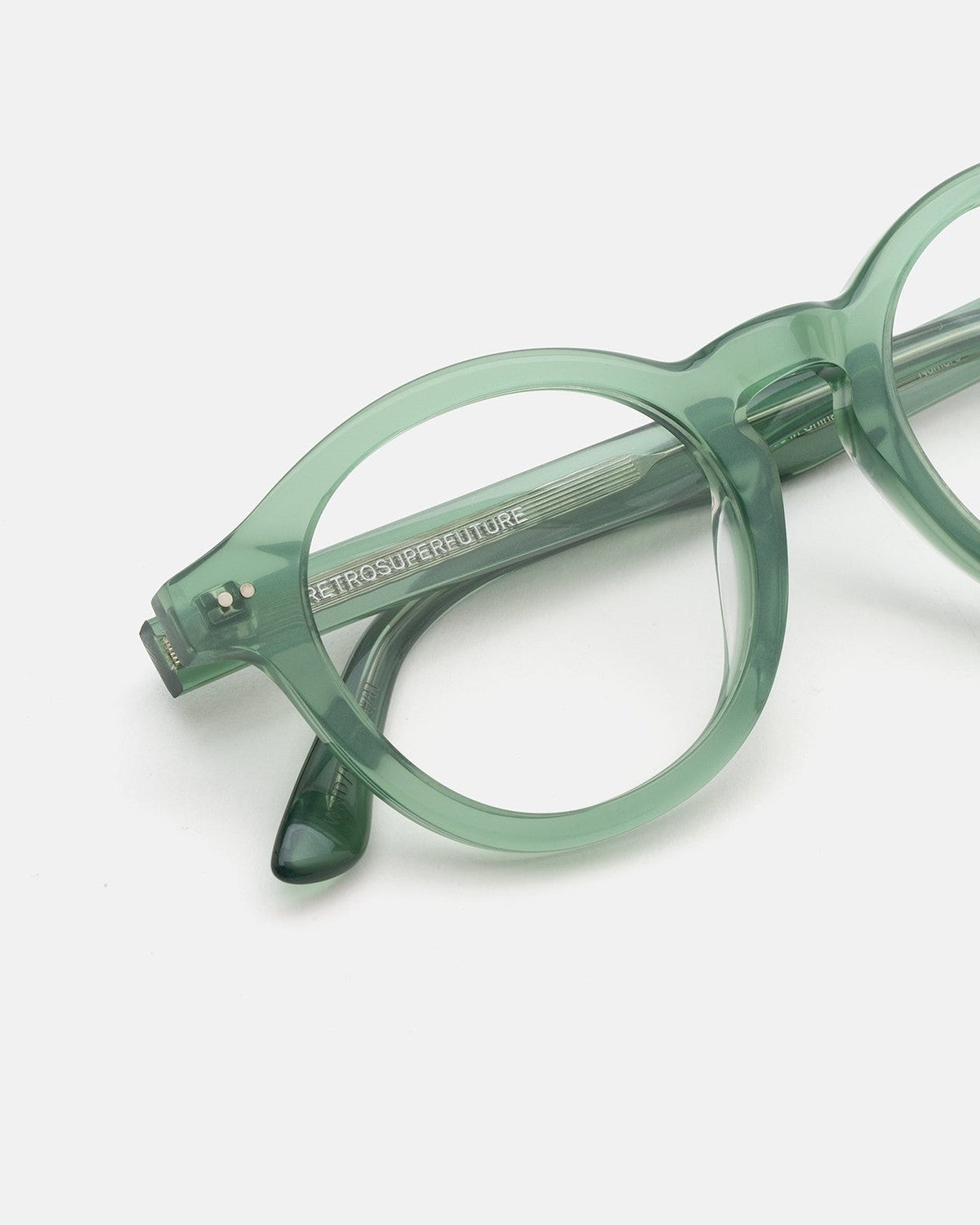 Close-up of the hinge and temple on RETROSUPERFUTURE Numero 129 Salvia sunglasses.