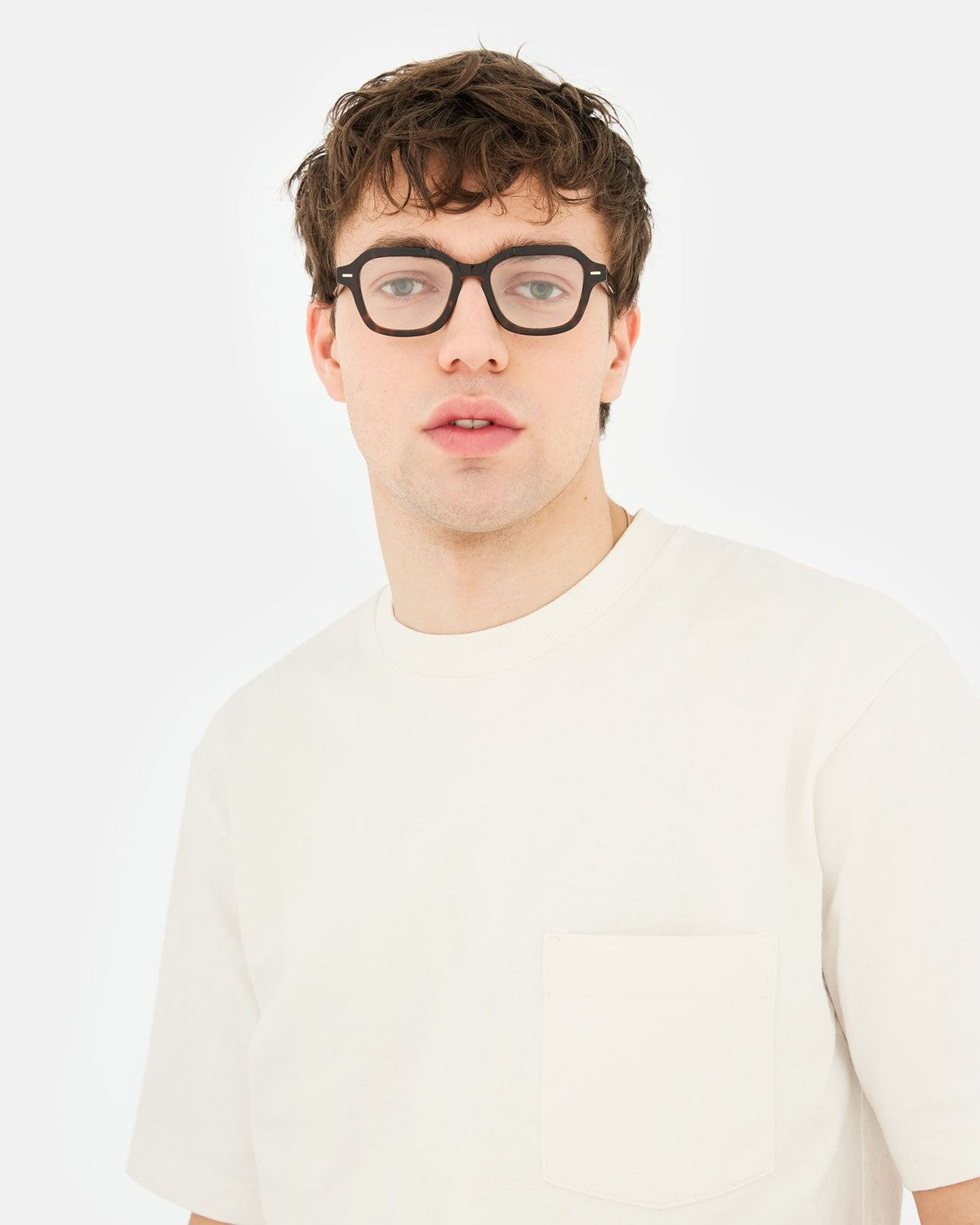 Front view of model wearing RETROSUPERFUTURE Numero 130 Havana sunglasses.