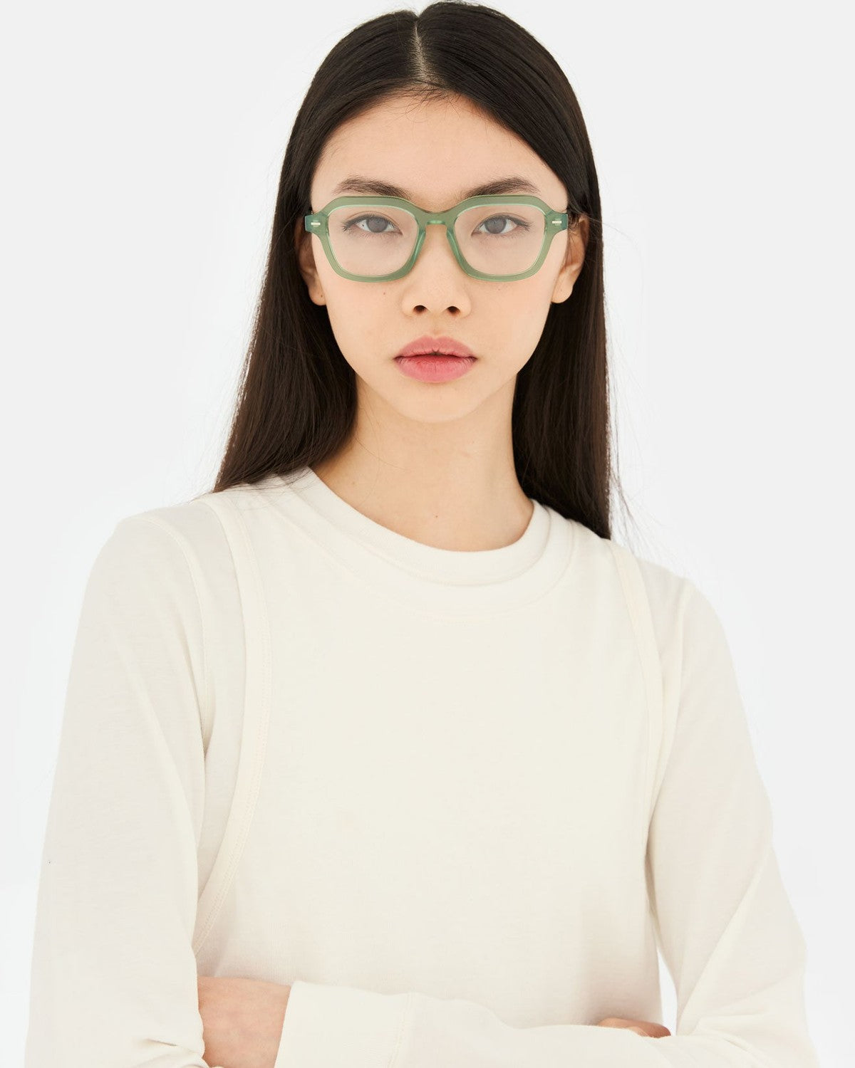 Model wearing RETROSUPERFUTURE Numero 130 Salvia sunglasses, front view.
