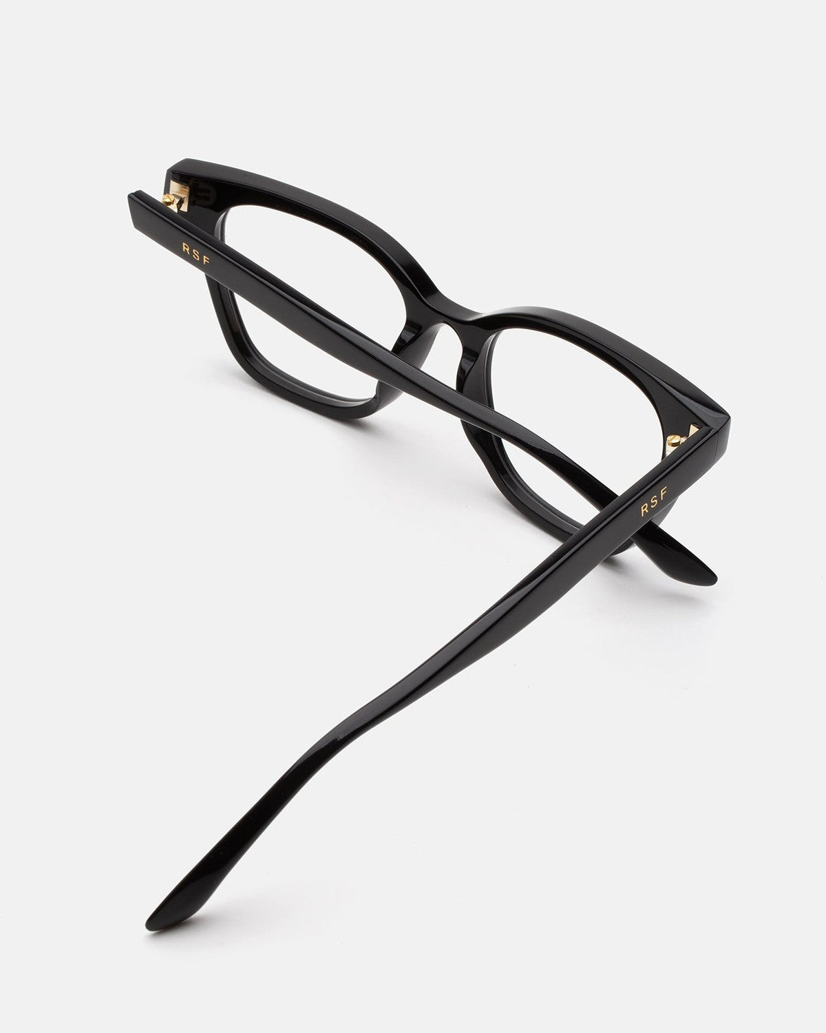 Folded view of RETROSUPERFUTURE Numero 131 Black sunglasses showing temple details.