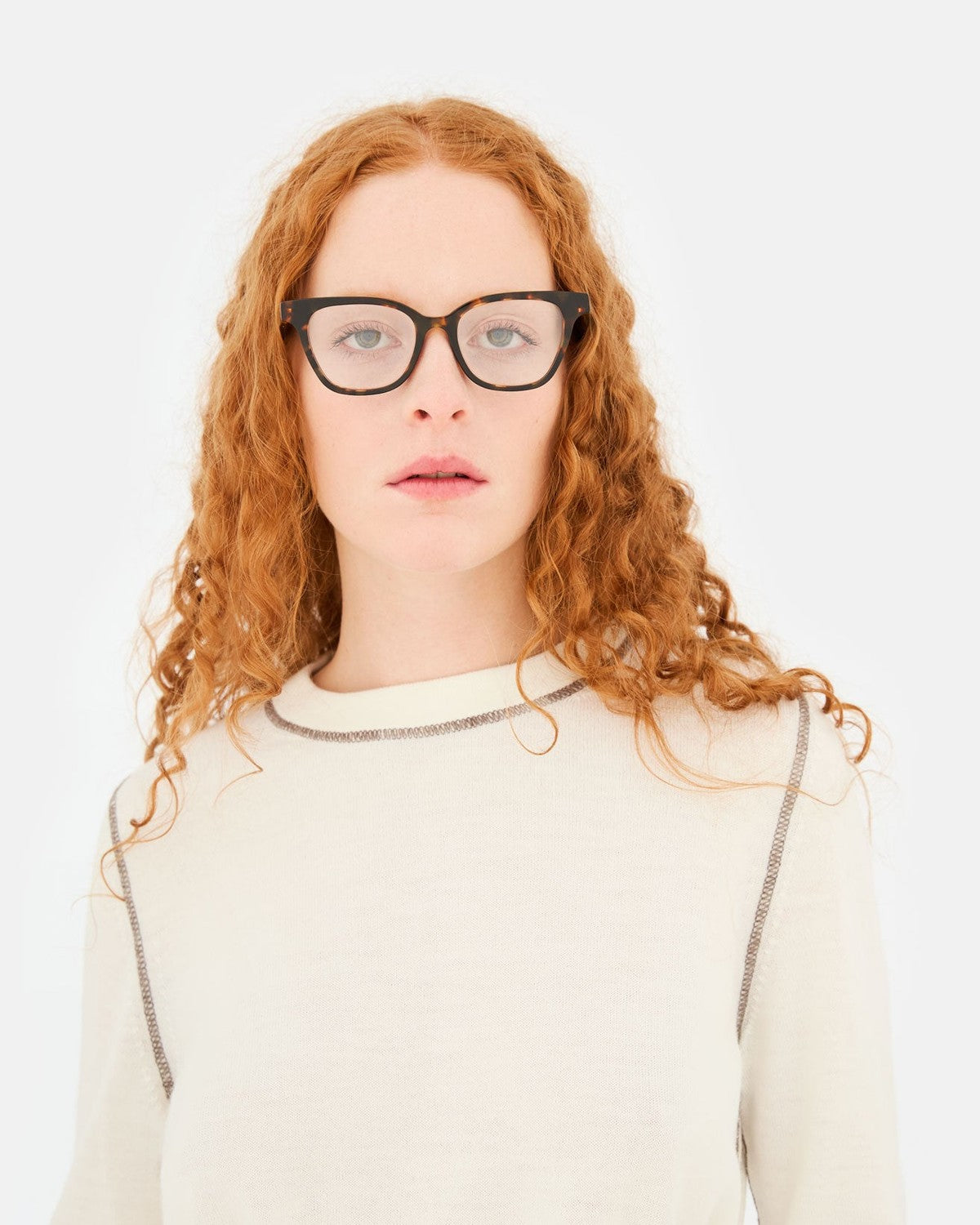 Model wearing RETROSUPERFUTURE Numero 131 Burnt havana sunglasses, front view.