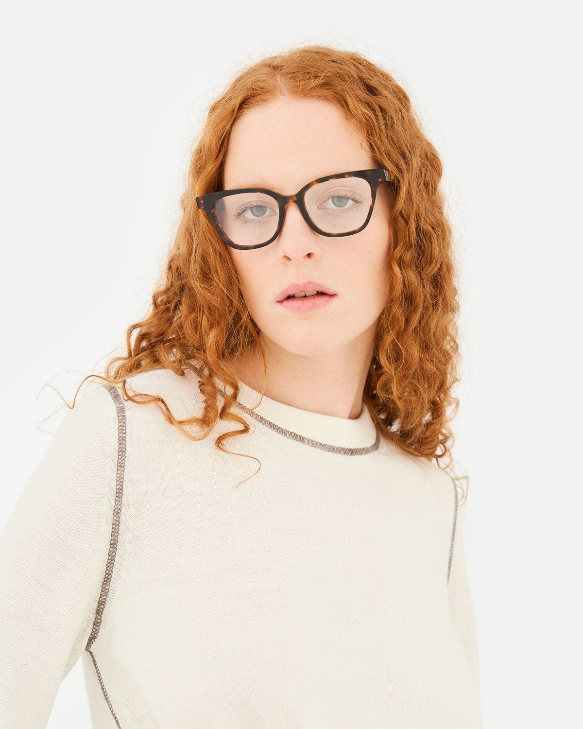 Model wearing RETROSUPERFUTURE Numero 131 Burnt havana sunglasses, angled view.