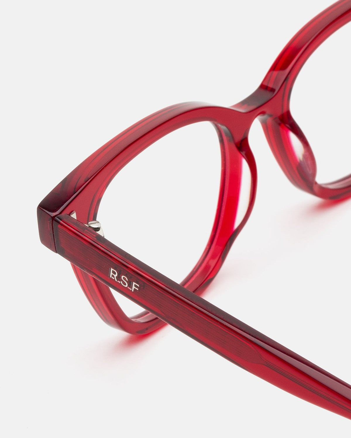 Close-up of the temple and hinge detail on RETROSUPERFUTURE Numero 131 Rossissimo sunglasses.