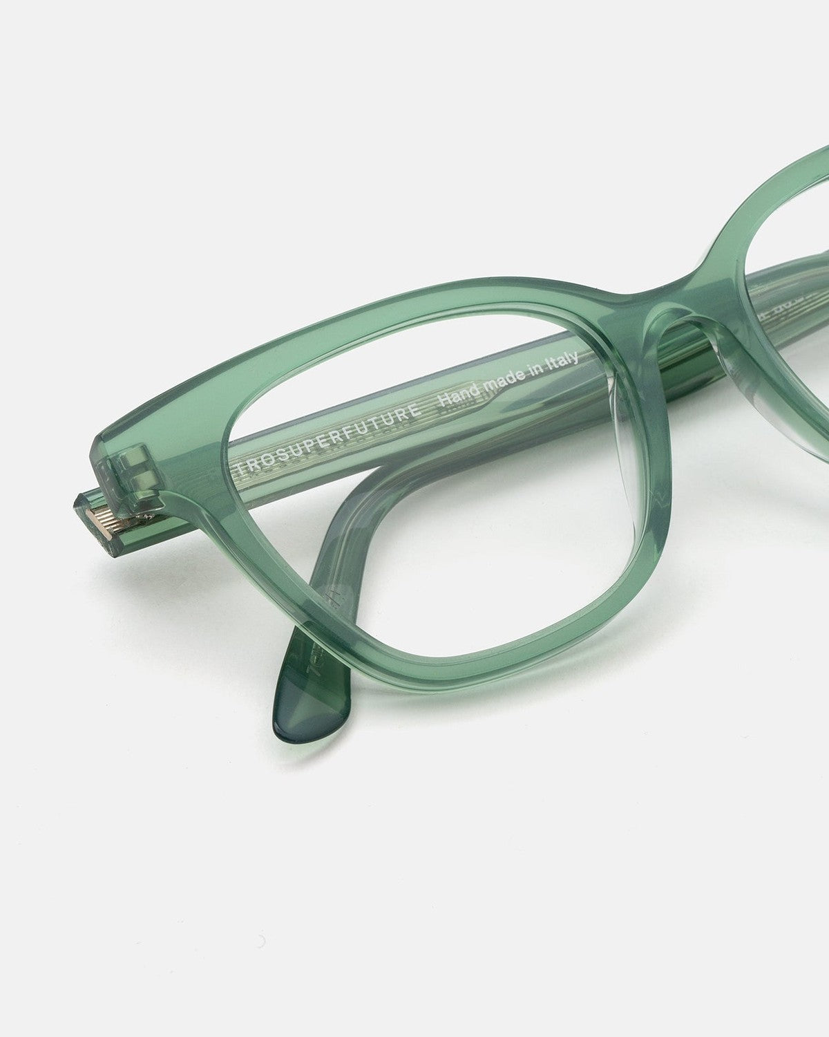 Close-up of the folded temple with branding on RETROSUPERFUTURE Numero 131 Salvia sunglasses.
