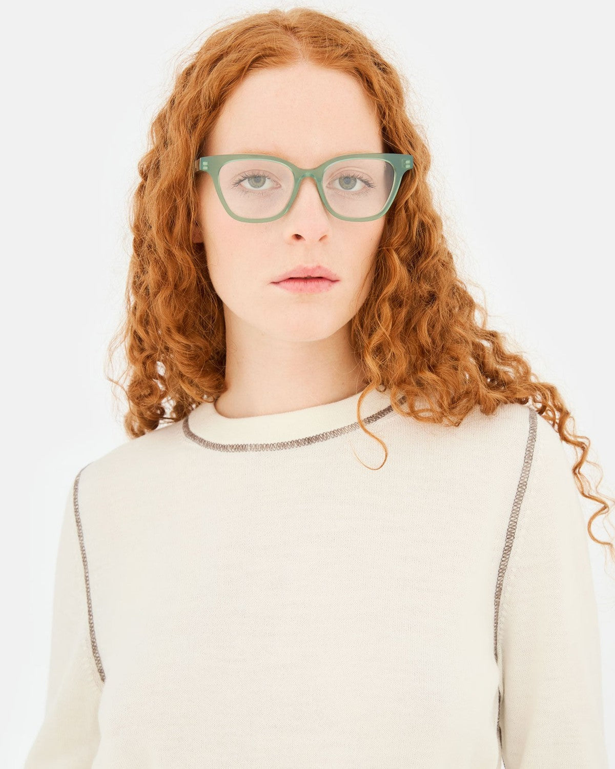 Model wearing RETROSUPERFUTURE Numero 131 Salvia sunglasses, front view.