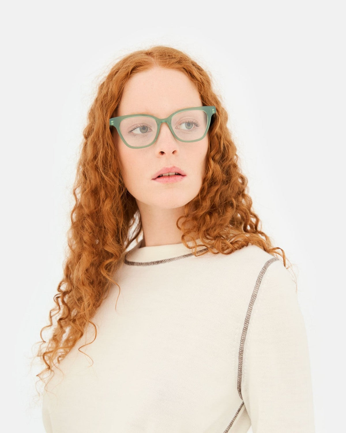 Model wearing RETROSUPERFUTURE Numero 131 Salvia sunglasses, angled view.