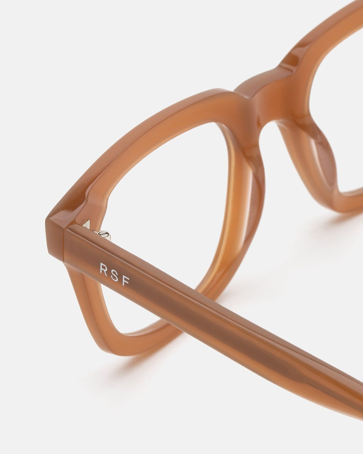 Close-up of the temple with RSF branding on RETROSUPERFUTURE Numero 132 Cola sunglasses.