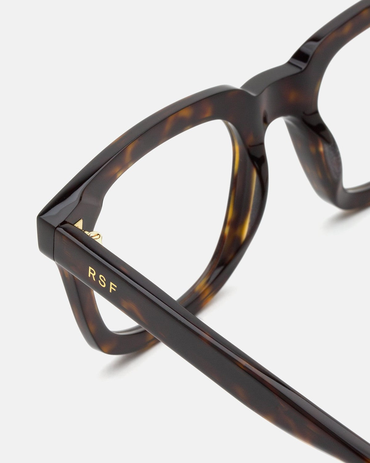 Close-up of the temple and hinge detail on RETROSUPERFUTURE Numero 132 Havana sunglasses.