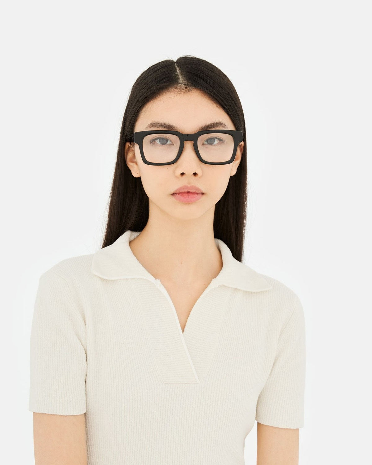 Model wearing RETROSUPERFUTURE Numero 133 Black sunglasses.