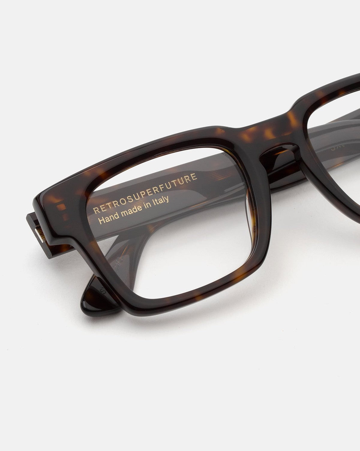 Close-up of the temple and branding on RETROSUPERFUTURE Numero 133 Havana sunglasses.