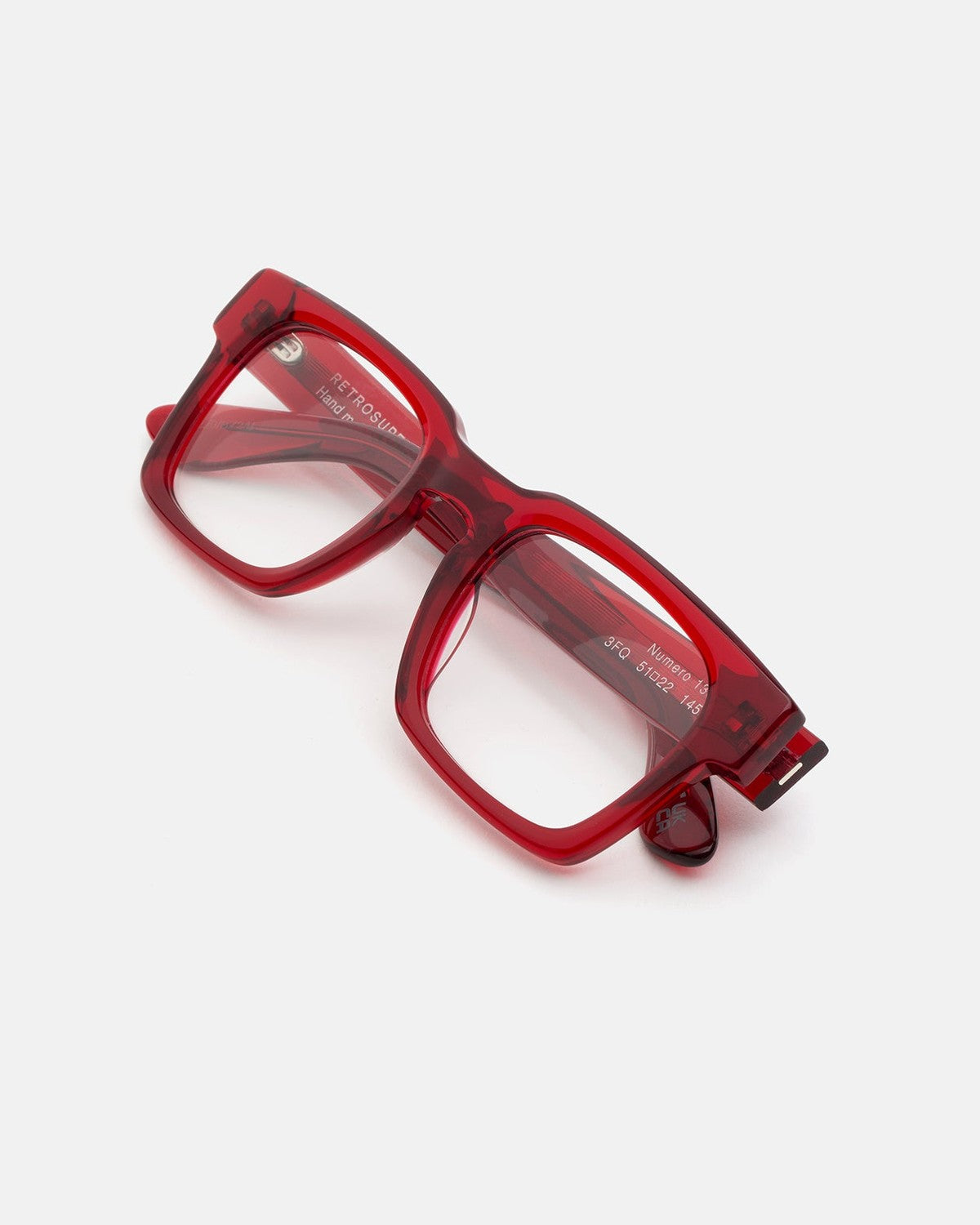 Folded view of RETROSUPERFUTURE Numero 133 Rossissimo sunglasses showing interior temple markings.