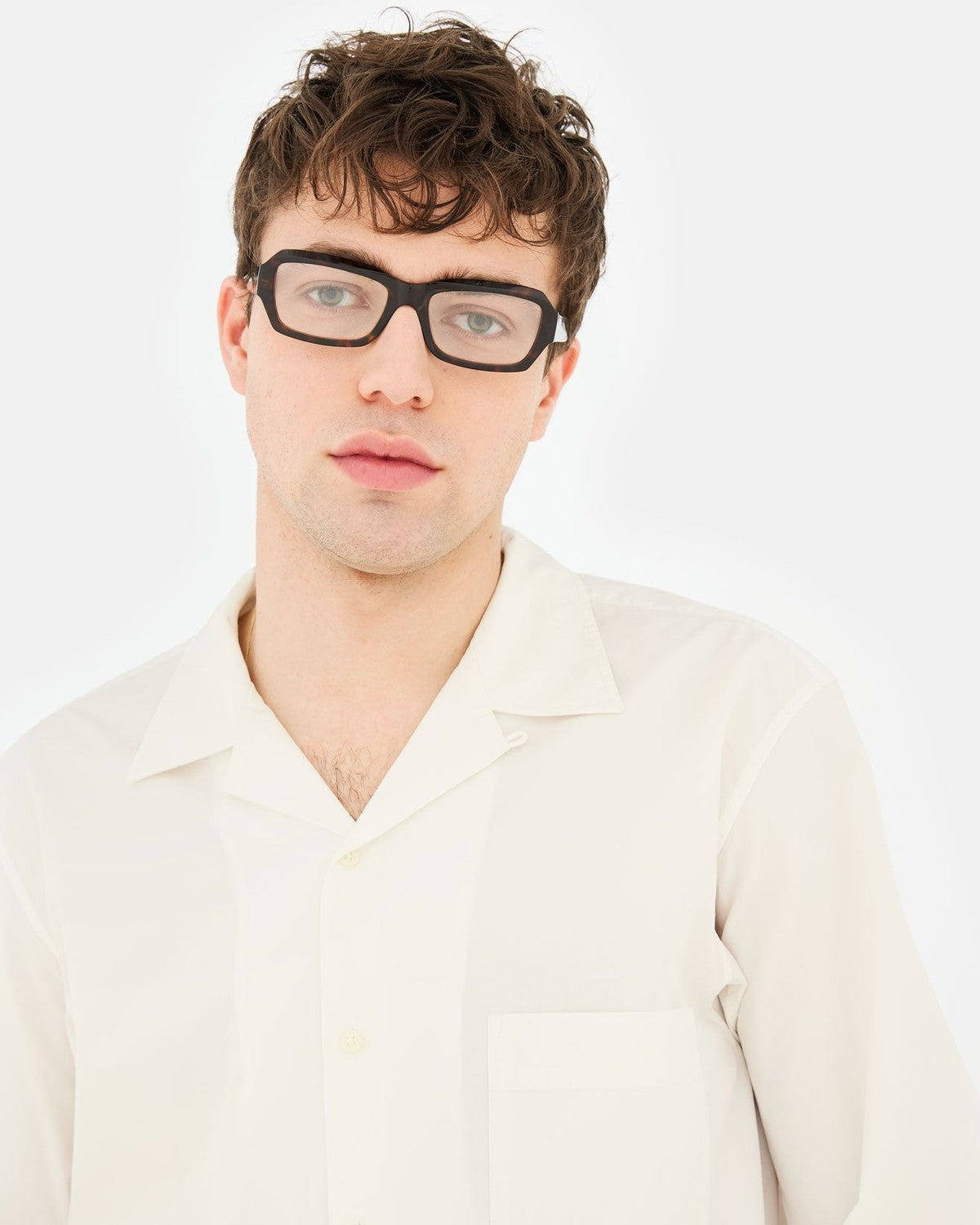 Model wearing RETROSUPERFUTURE Numero 134 3627 sunglasses in front view.