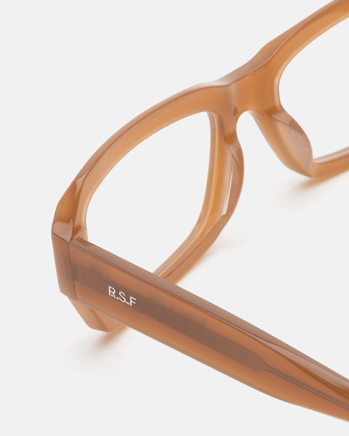 Close-up of the temple and R.S.F logo on RETROSUPERFUTURE Numero 134 Cola sunglasses.