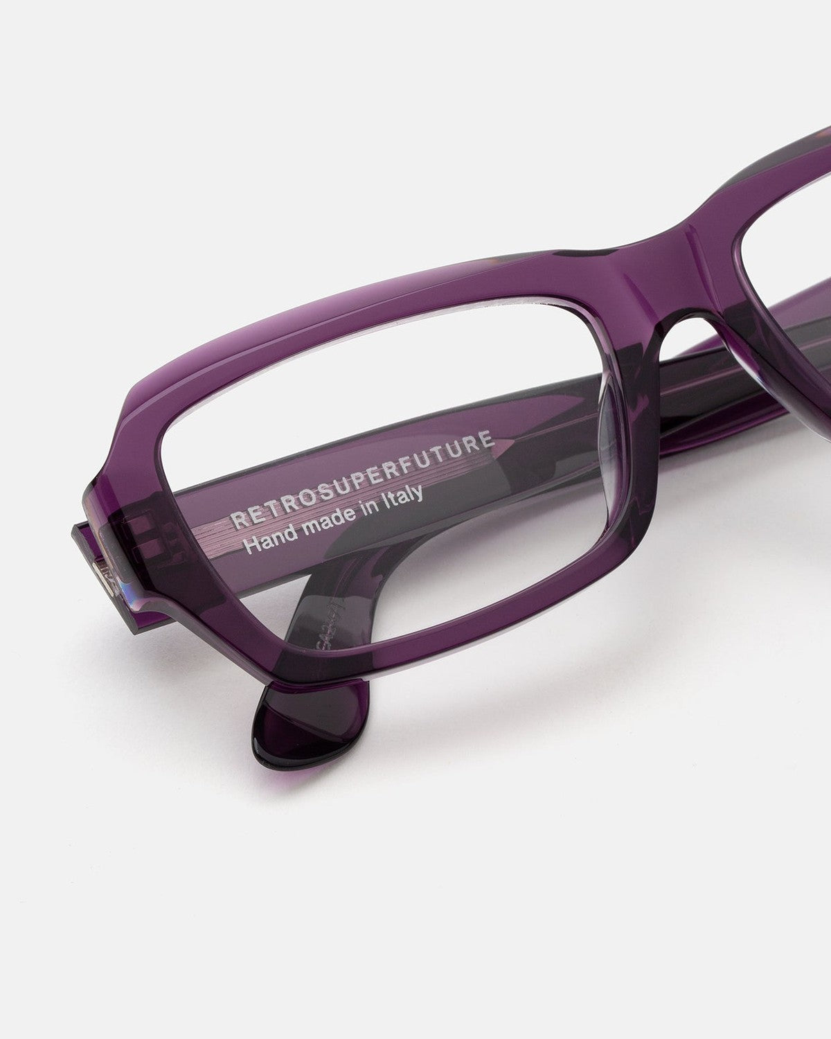 Close-up of the temple and hinge on RETROSUPERFUTURE Numero 134 Melanzana sunglasses.