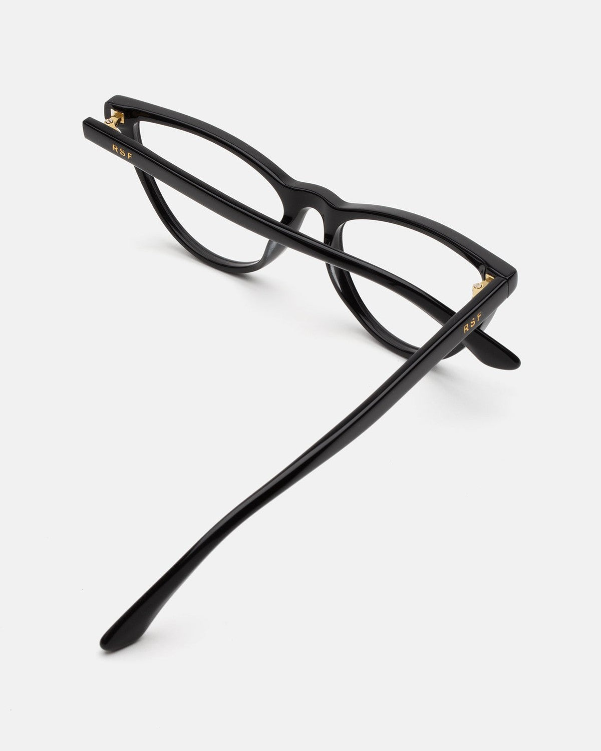 Angled overhead view showing the temples and hinges of RETROSUPERFUTURE Numero 135 Black sunglasses.