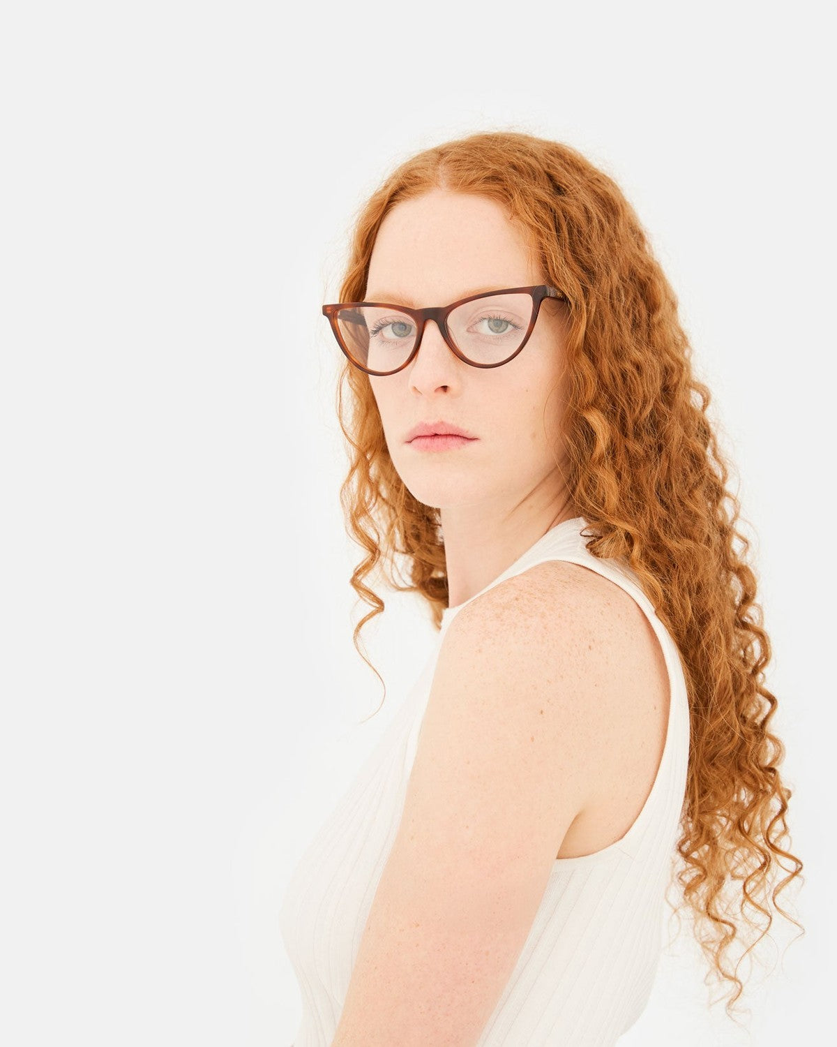 Model wearing RETROSUPERFUTURE Numero 135 Havana Diversa sunglasses, side angle.