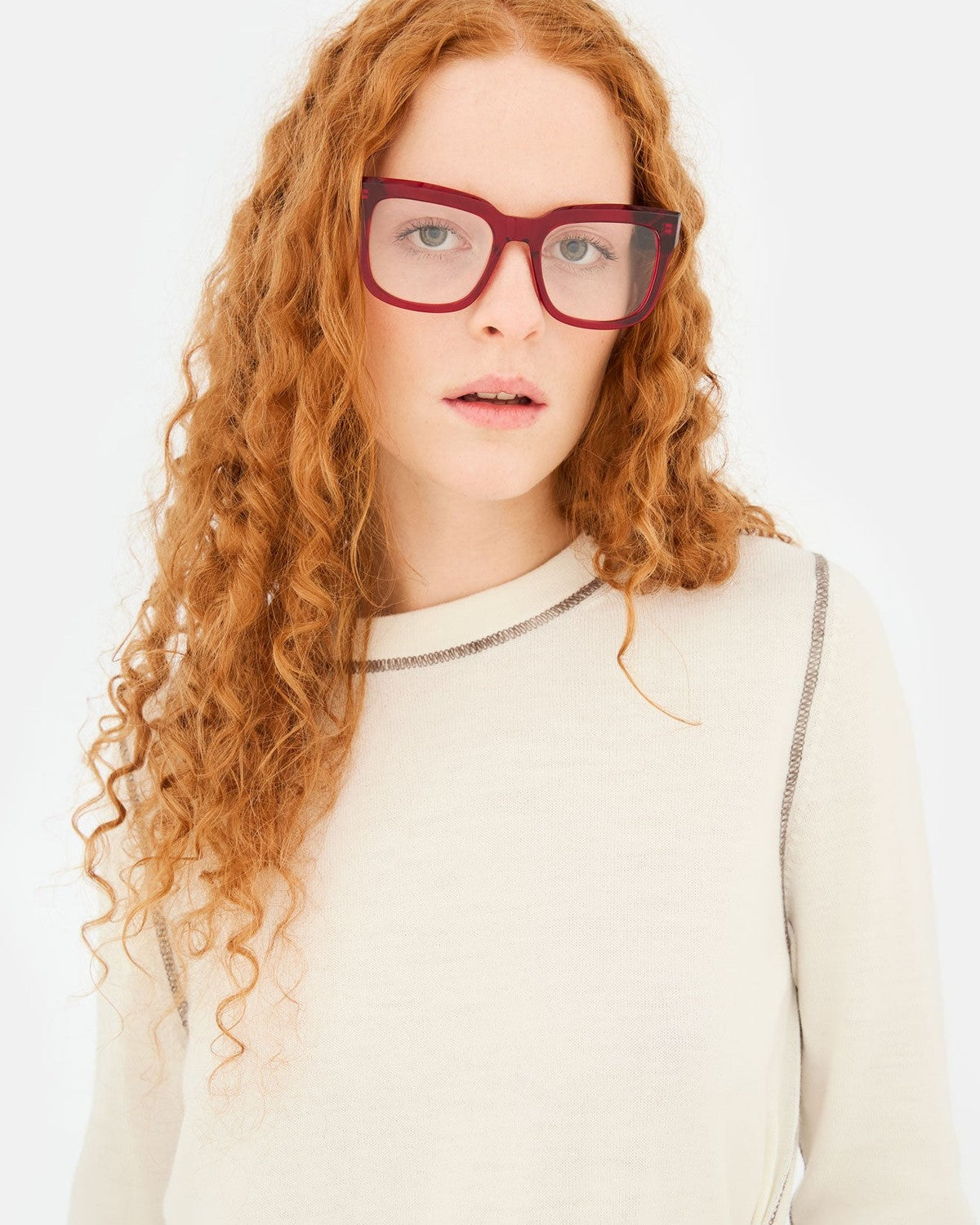 Model wearing RETROSUPERFUTURE Numero 136 Rossissimo sunglasses.