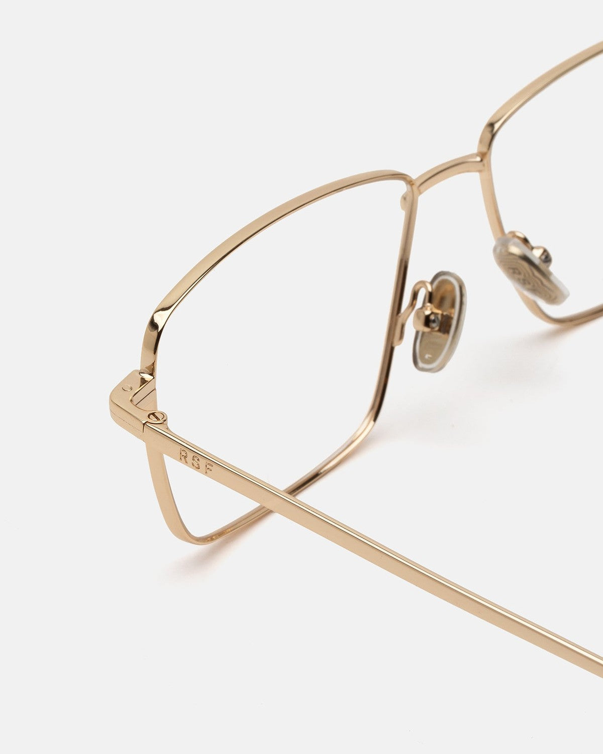 Close-up of the hinge and temple on RETROSUPERFUTURE Numero 139 Cremoso sunglasses.
