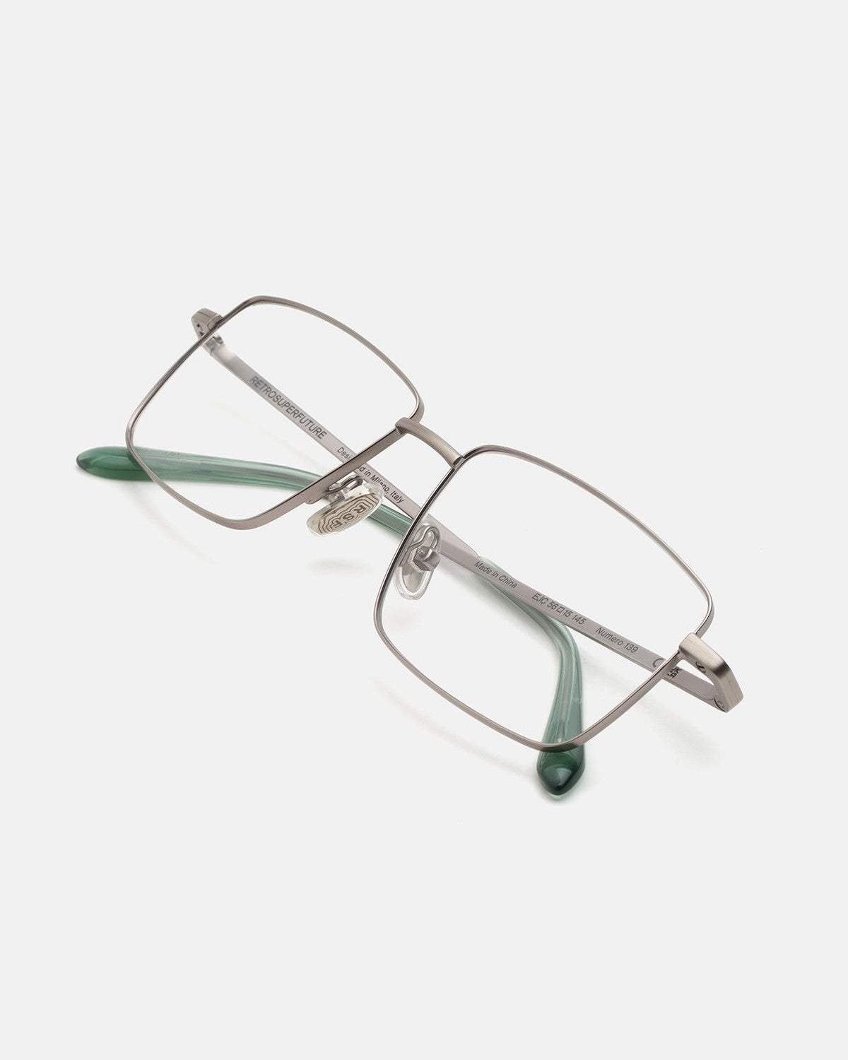 Folded view of RETROSUPERFUTURE Numero 139 Salvia sunglasses showing green temple tips.
