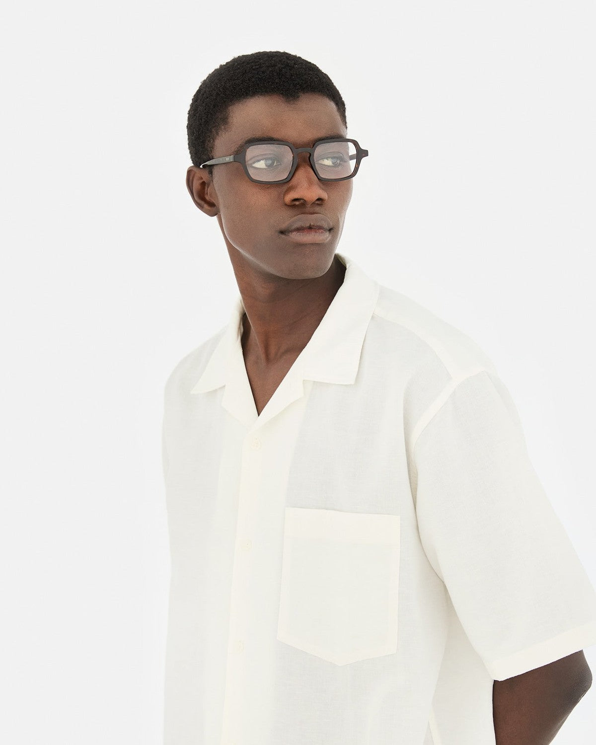 Model wearing RETROSUPERFUTURE Numero 141 Havana sunglasses in side profile.
